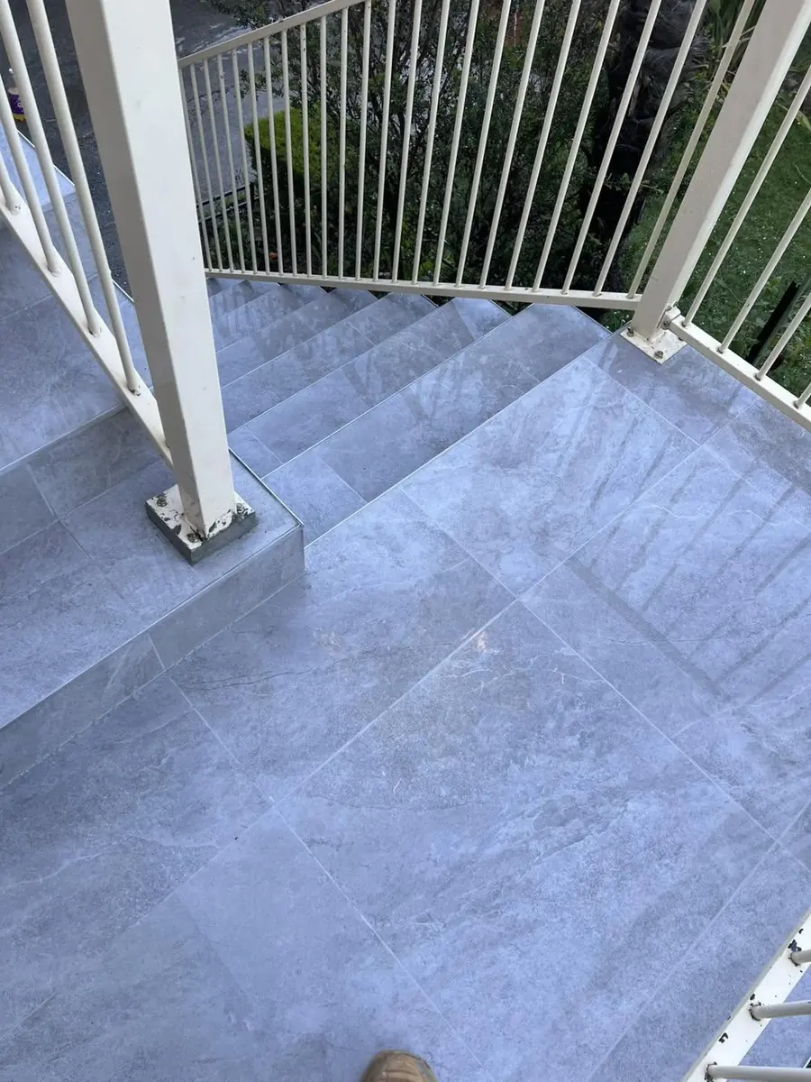 Grey porcelain balcony and stair landing