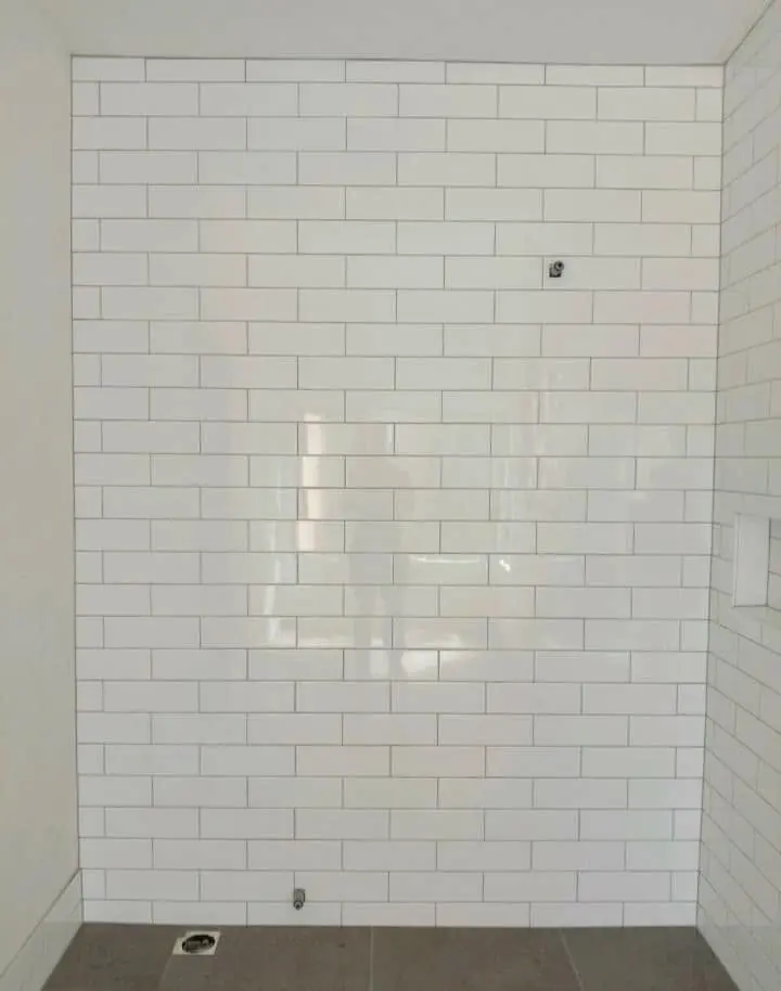 White subway tiles on a shower wall